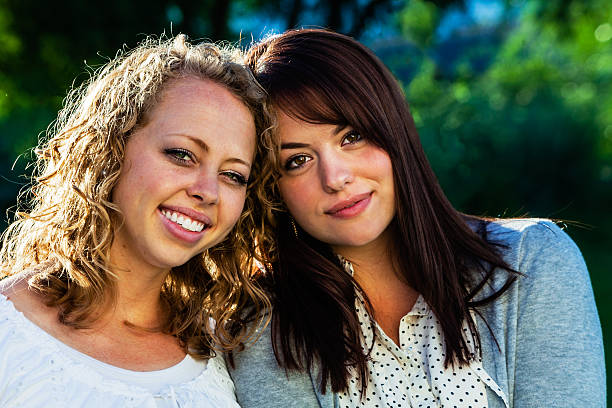 istock Blonde and Brunette Female Friends 180867694