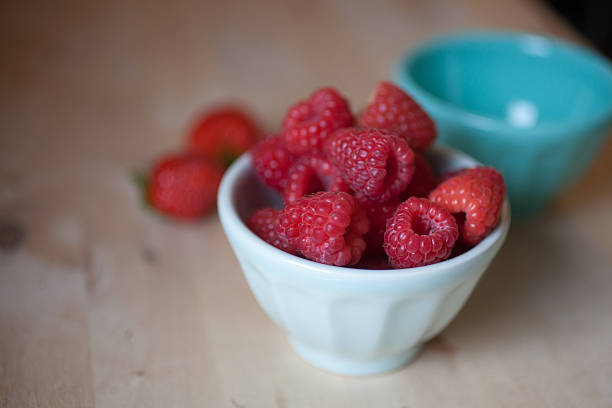 istock Small bowl of raspberries 180867698