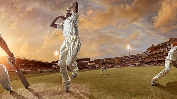 istock Bowler Delivering a Fast Ball During a Cricket Game 180867758