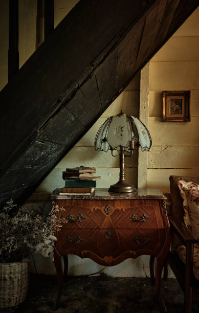 istock Old vintage interior with antique lamp and books 1808678187