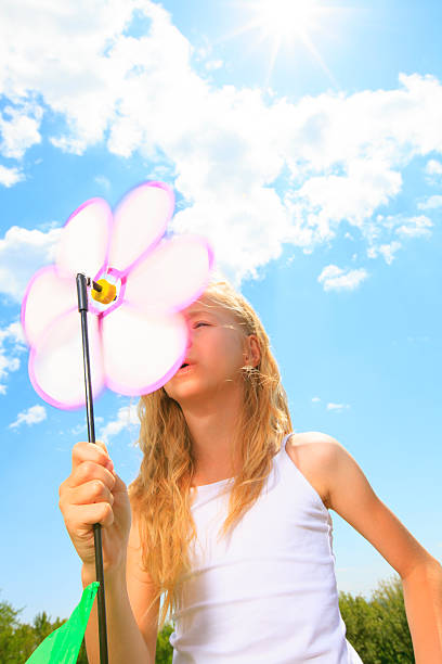 istock Little Blond Girl - Wind Whisper 180868024