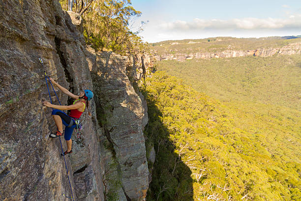 istock Blue Mountains with Woman Climber 180868104