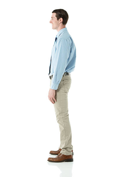 istock Side view of a businessman posing against white 180868158
