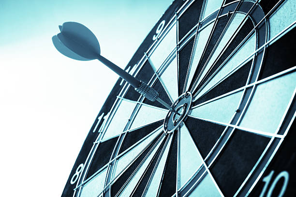 istock Black and white dart table with dart in bullseye 180869404