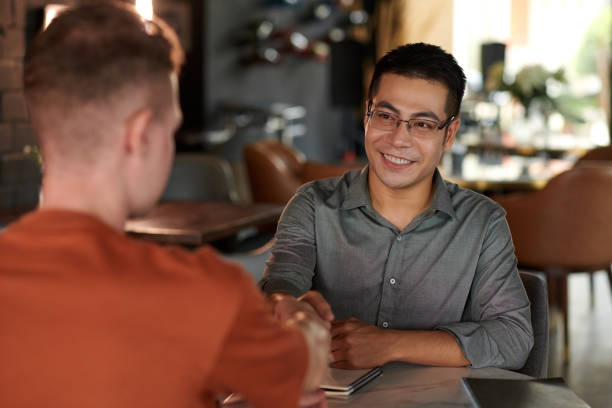 istock Startupper Meeting with Investor in Cafe 1808734502