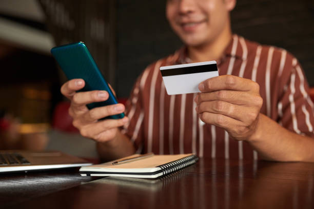 istock Man Paying with Credit Card when Shopping 1808735116