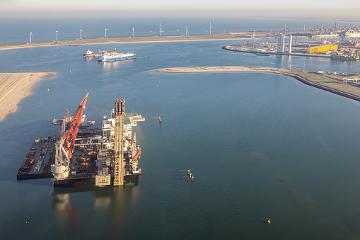 Aerial view at heavy deepwater construction and crane vessel harbor Rotterdam