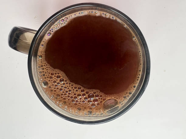 istock Coffee in a cup top view on a white background 1808743619