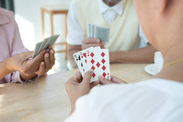 istock Elderly person play cards. 1808761382