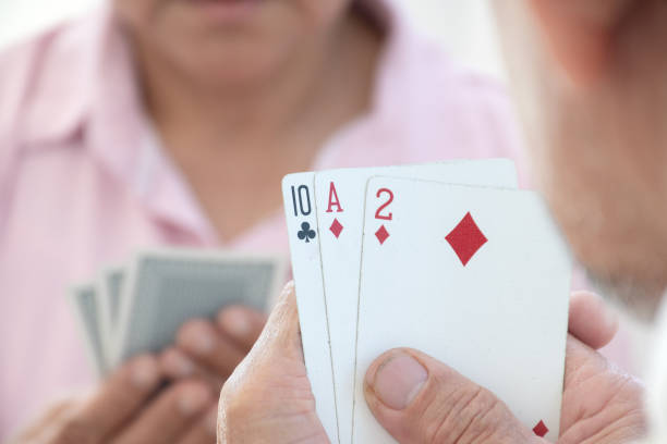 istock Elderly person play cards. 1808763962