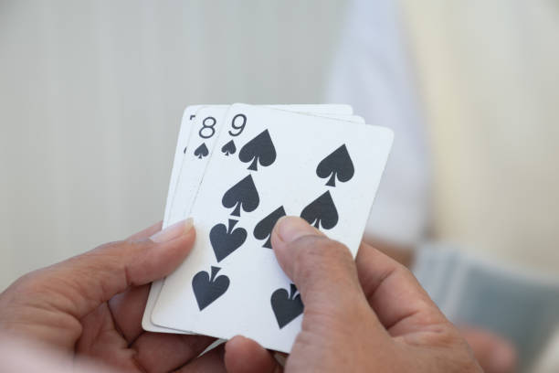 istock Elderly person play cards. 1808767819
