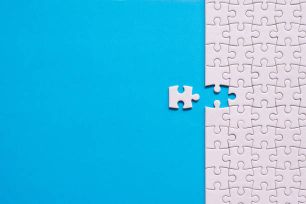 istock Jigsaw puzzle white color,Puzzles pieces grid,Success mosaic solution template,Horizontal on blue color background copy space for text,Top view 1808767823