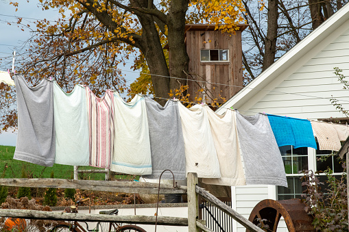 Gap, USA - November 11, 2023. Towels hanging on rope for drying outdoor at an Amish hosue, Lancaster County, Pennsylvania, USA
