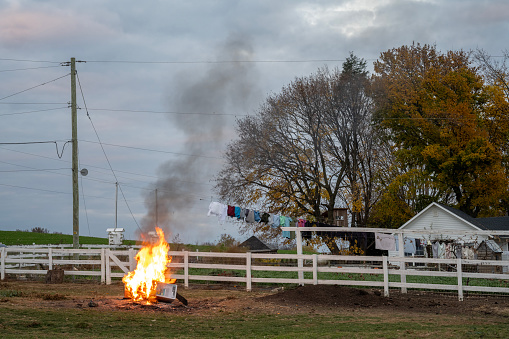 Gap, USA - November 11, 2023. Burning box at backyard of an Amish family, Lancaster County, Pennsylvania, USA