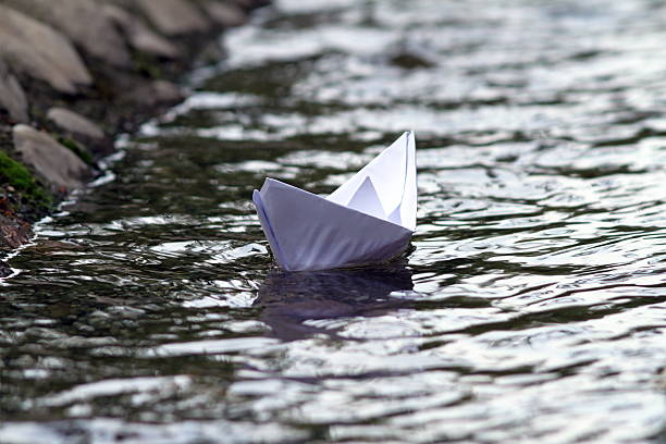 istock abstract view of paper boat 180878755