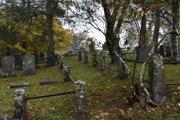 istock Whimsical Sleepy Hollow Cemetery Hillside on a Rainy Fall Day 1808813337