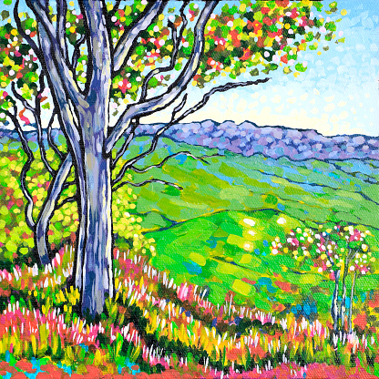 Tree on a country hillside with distant mountains and a green valley. From a small acrylic painting by Judi Parkinson