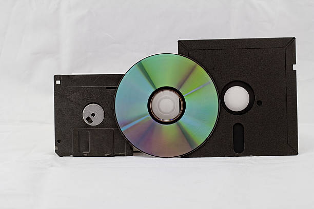 de moda disquete um cd, dvd - dvd obsolete cd cd rom imagens e fotografias de stock