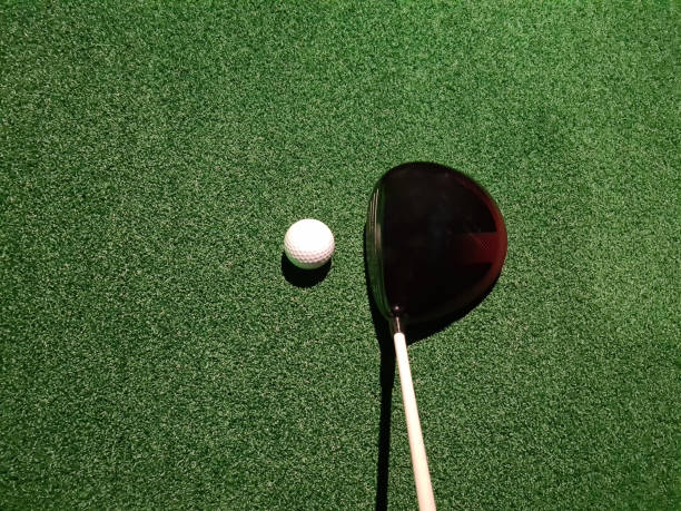 istock Driver preparing golf club for golf ball seen from golfer side 1808831333