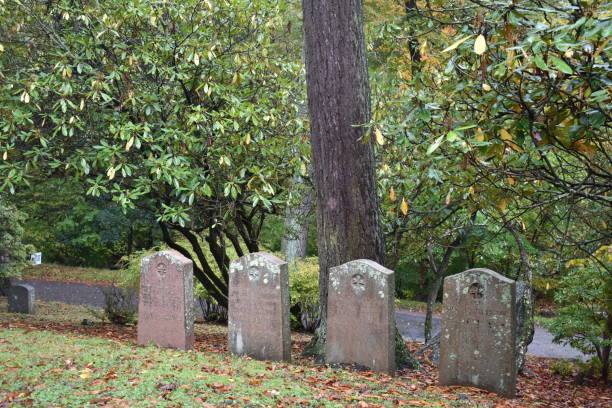 istock Four Gravestones at Sleepy Hollow Cemetery on a Rainy Fall Day, NY 1808835011