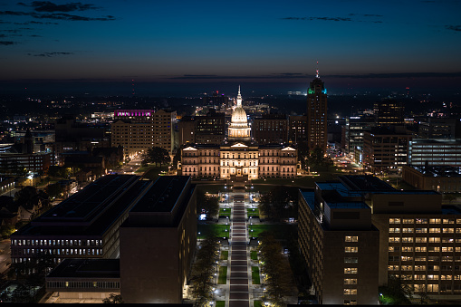 Aerial shot of the Michigan State Capitol Building in Lansing in pre-dawn twilight on a Fall morning. 

Authorization was obtained from the FAA for this operation in restricted airspace.