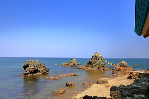 Mie, Japan- September 28th, 2023: Sacred Meoto Iwa (Wedded Rocks) near Futamiokitama Shrine at Futami, Mie Prefecture, Japan