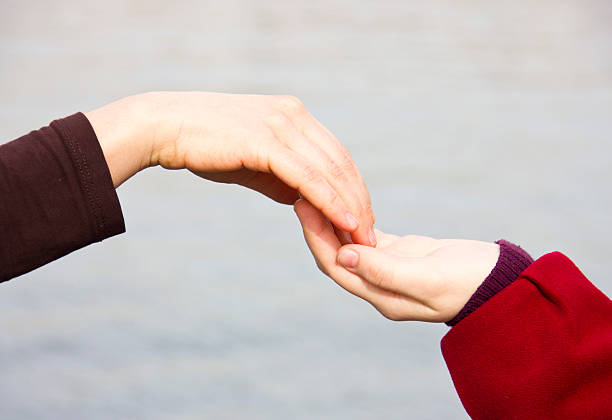 istock young adults helping on their own 180885776