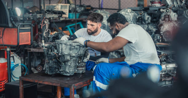 istock Car technician check engines, choose quality gear for precise repairs to ensure optimal performance 1808858177