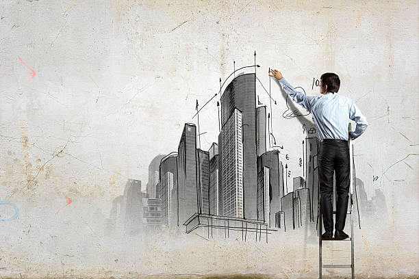 istock Businessman drawing sketch 180886165