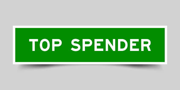 Sticker label with word top spender in green color on gray background
