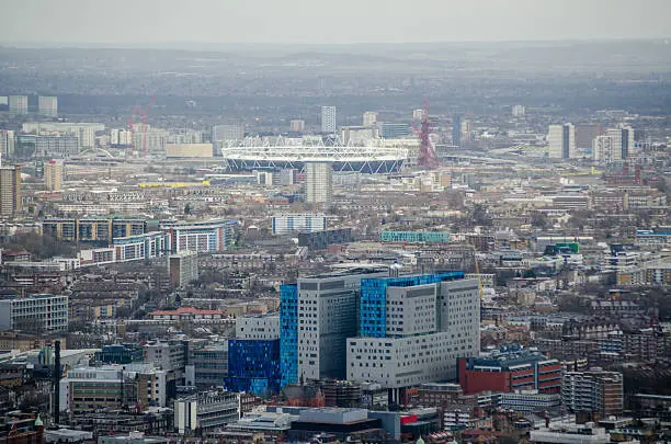 View from a tall building of the large Royal London Hospital in Whitechapel, East London with the athletic stadium in Stratford to the rear.