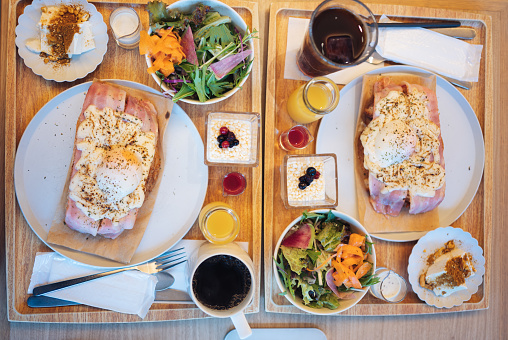 Western and japanese fusion brunch serve on plate with decoration with vegetable coffee bread in japan