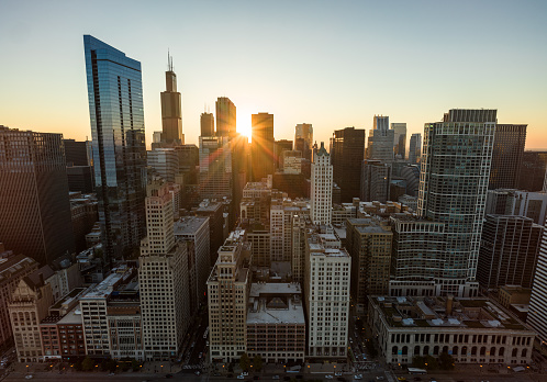 Aerial still image of downtown Chicago, Illinois on a clear sunset in Fall.
