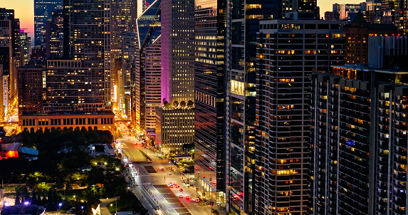 Aerial still image of East Randolph Street in Chicago, Illinois in the evening.