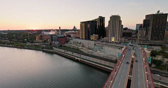 Aerial still image of Mississippi River and downtown St. Paul, Minnesota at sunset.

Authorization was obtained from the FAA for this operation in restricted airspace.