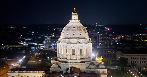 Aerial still image of Minnesota State Capitol in St. Paul, Minnesota on a clear night in Fall.\n\nAuthorization was obtained from the FAA for this operation in restricted airspace.