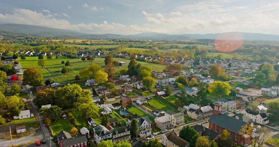 Aerial still image of houses in the town of Boonsboro, Maryland, taken by a drone on a Fall afternoon.