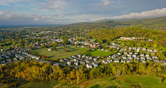 Aerial still image of residential houses in the town of Boonsboro, Maryland, taken by a drone on a Fall afternoon.