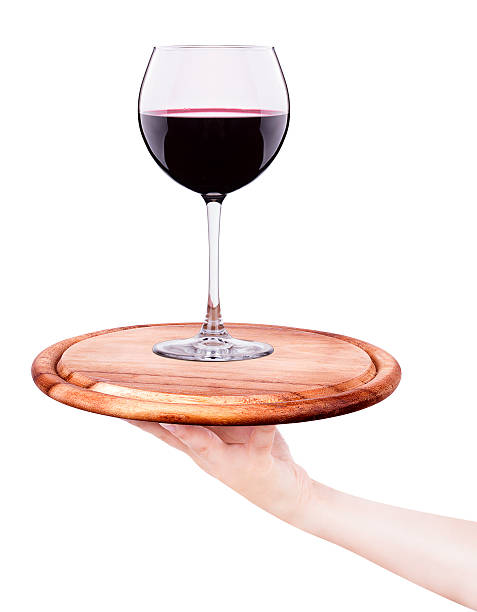 istock Elegant red wine glass in white background 180889670