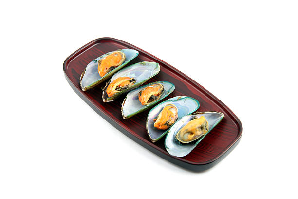 istock Mussels on wooden dish. 180889904