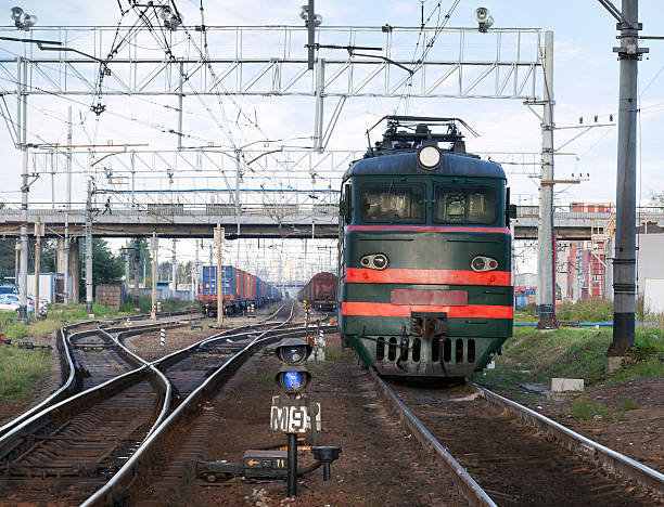 istock Railway scene with locomotive and cargo trains 180894919