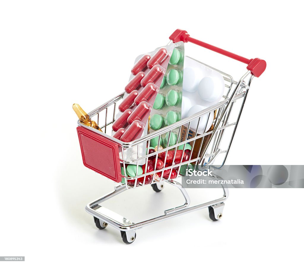 Carrello della spesa con pillole farmaco e - Foto stock royalty-free di Affari