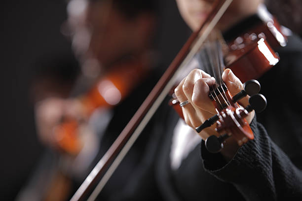 istock Classical music. Violinists in concert 180895349
