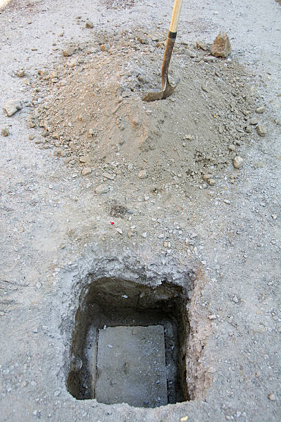 istock Septic tank lid with shovel and dirt pile 180897682