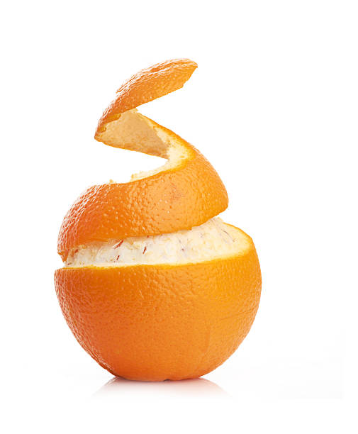 istock orange with peeled spiral skin 180898674