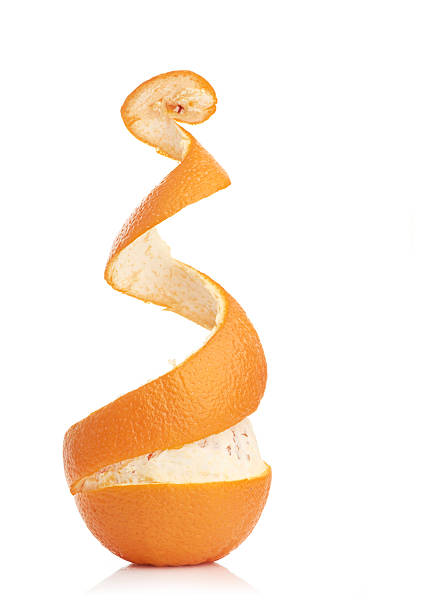 istock orange with peeled spiral skin 180898729
