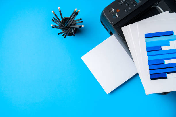 istock Modern printer with paper on blue background 1808987711