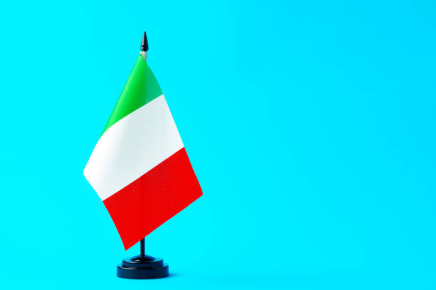 istock Flag of Italy on blue background studio shot 1809000502