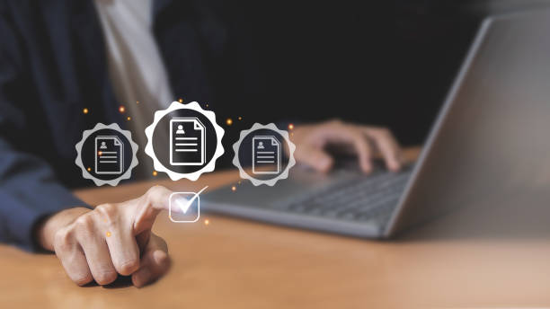 istock Business performance tracking concept, businessman using laptop to check online digital forms, blue background. 1809014698