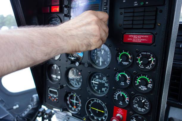 istock Helicopter cockpit. Control panels of a modern helicopter. The pilot is making final adjustments for takeoff. 1809023105